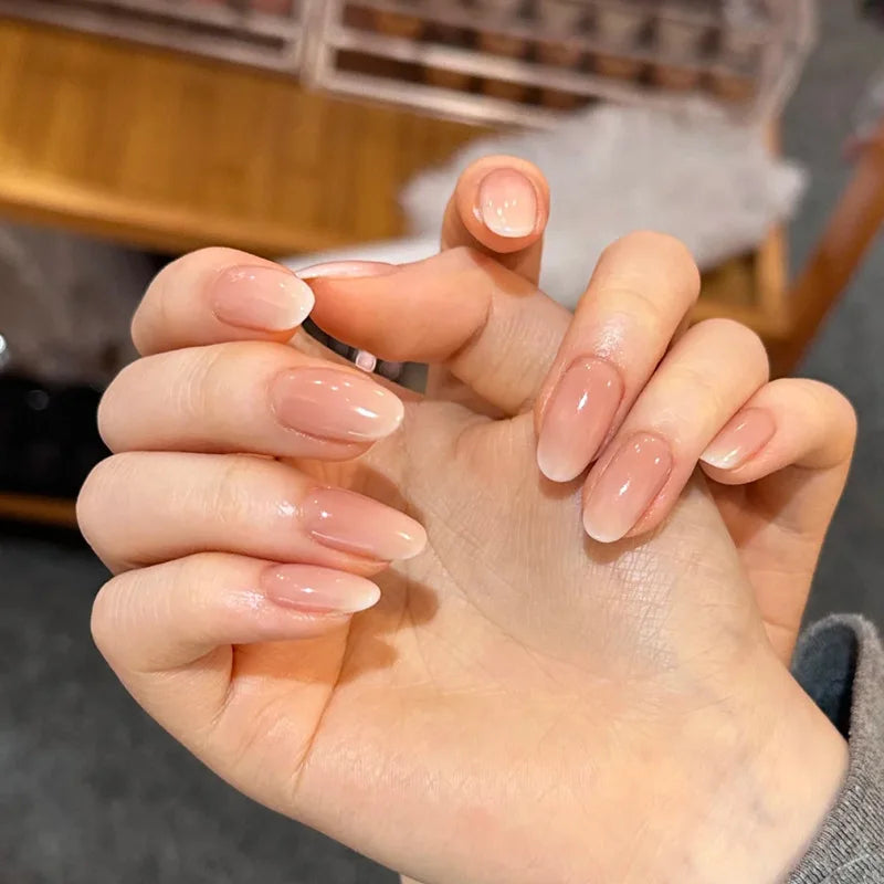 24Pcs Short Oval Head Blush Pink Press on Nails with Simple Designs Almond Nails Wearable Acrylic Full Cover Nail Tips with Glue 33