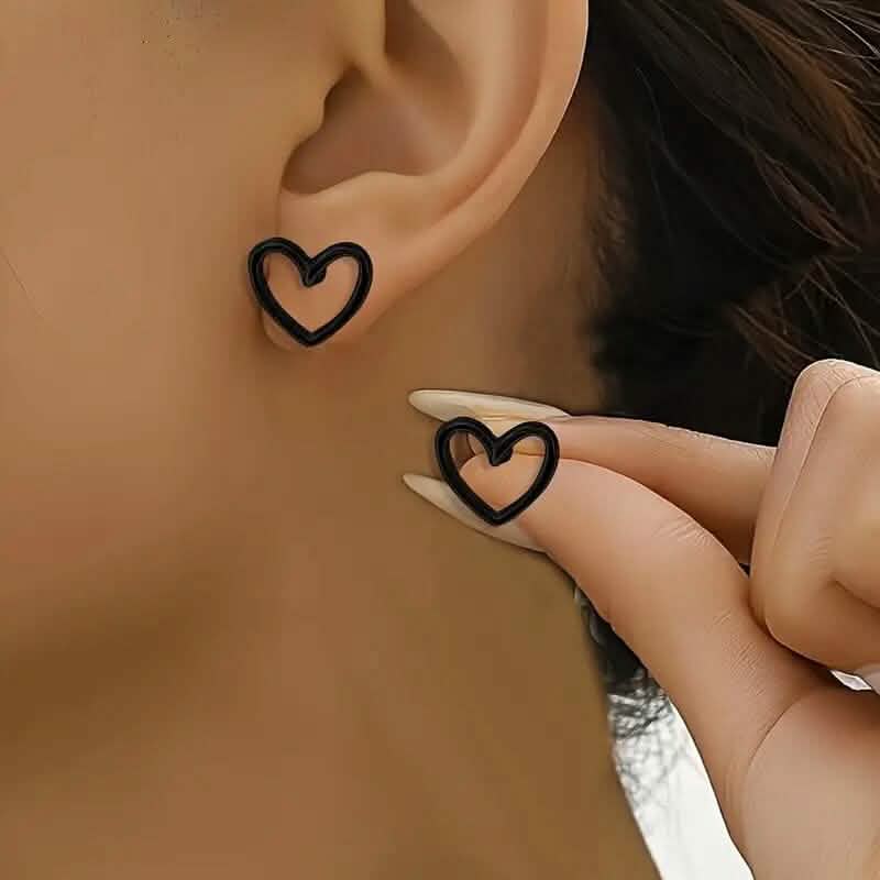 Glossy Hollow Heart Design Stud Earrings 1